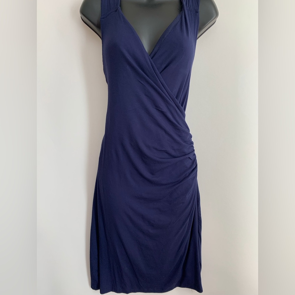 Nine 1 eight bodycon dress blue sleeveless low cut, lined, Jersey like fabric.